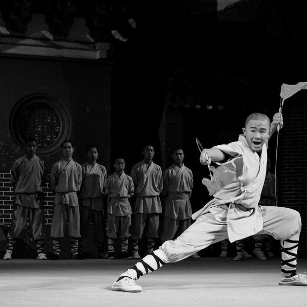Person demonstrating improved flexibility during practice.